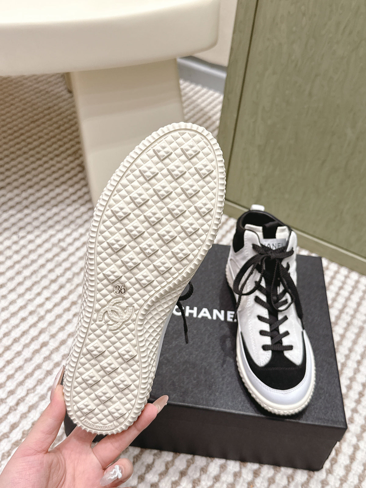 CHANEL 25S HIGH-TOP SNEAKERS IN BLACK AND WHITE CALFSKIN AND SUEDE