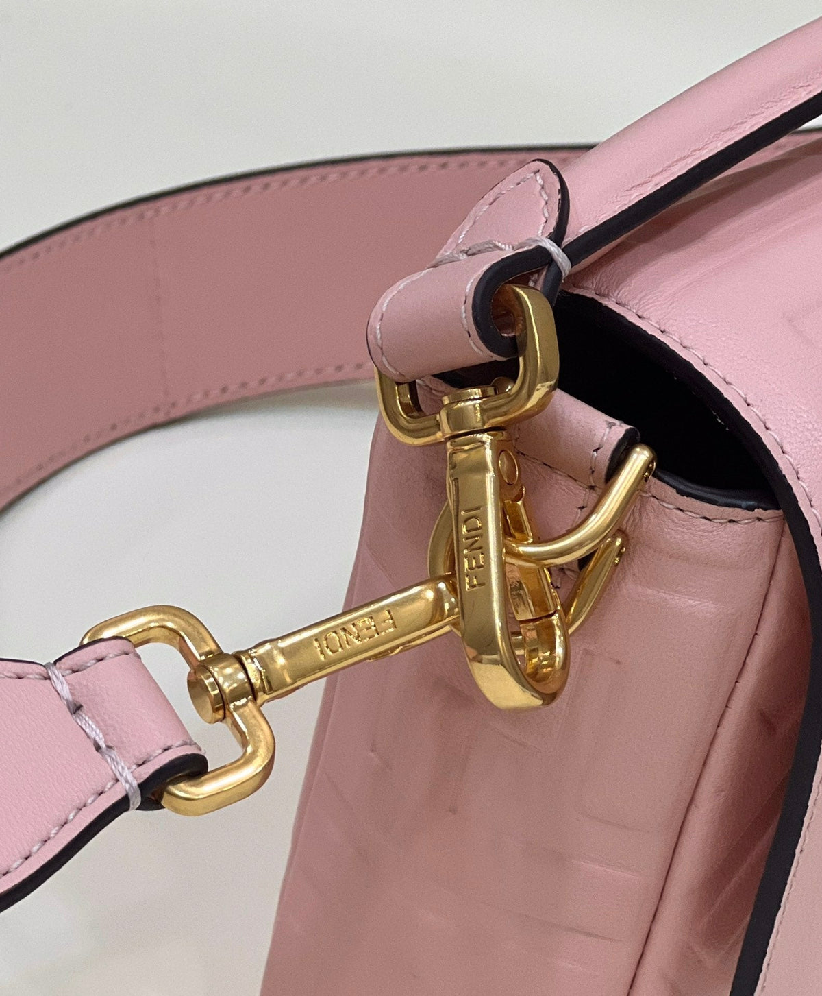 BAGUETTE WITH FF MOTIF 27 IN LIGHT PINK SOFT LAMBSKIN GOLD HARDWARE