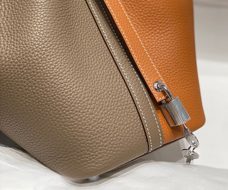 HERMES 25S PICOTIN LOCK 18 IN BROWN AND ORANGE COMBINATION CALFSKIN SILVER HARDWARE
