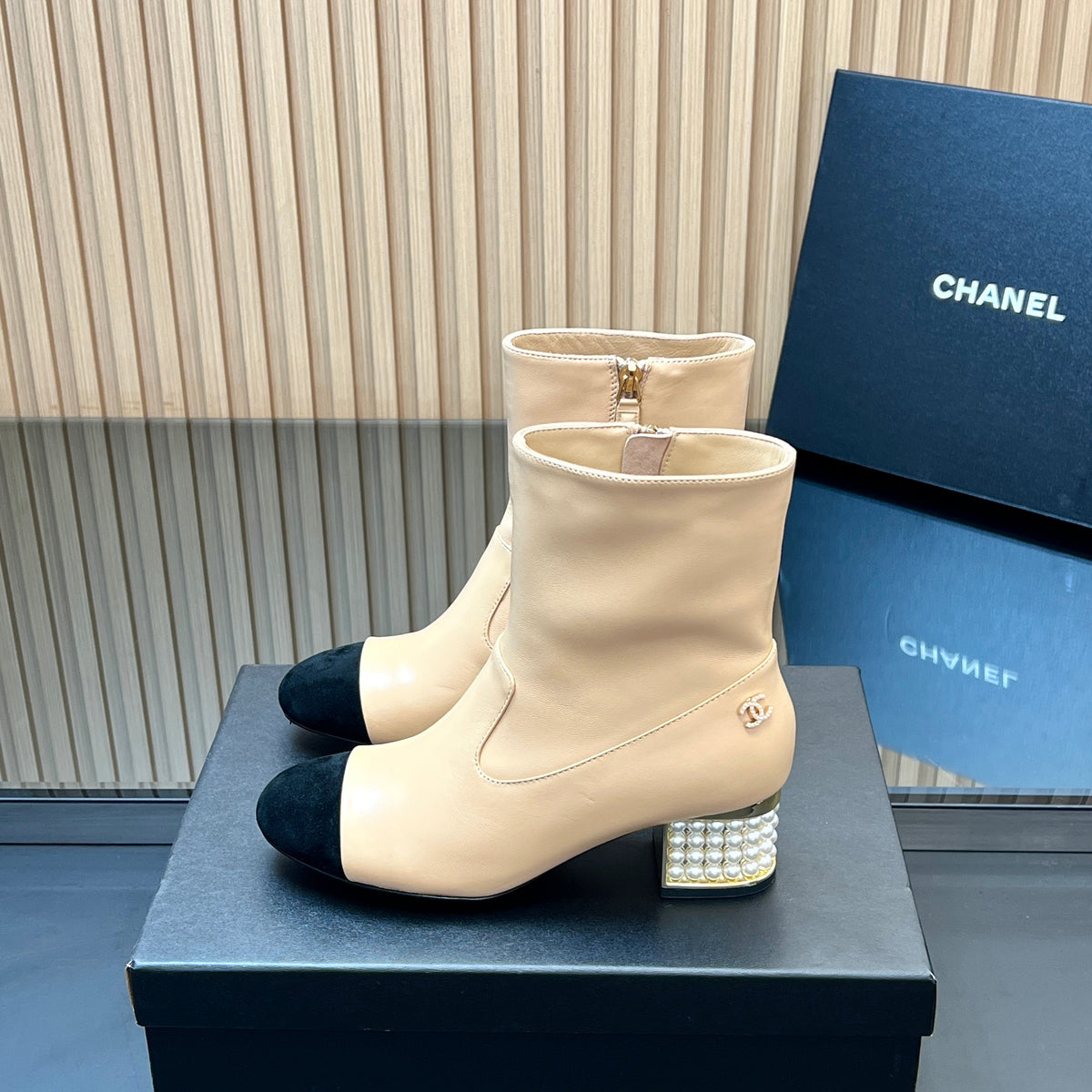 CHANEL 25S TALL BOOTS WITH PEARL DETAILS 50MM IN BEIGE CALFSKIN AND BLACK SUEDE