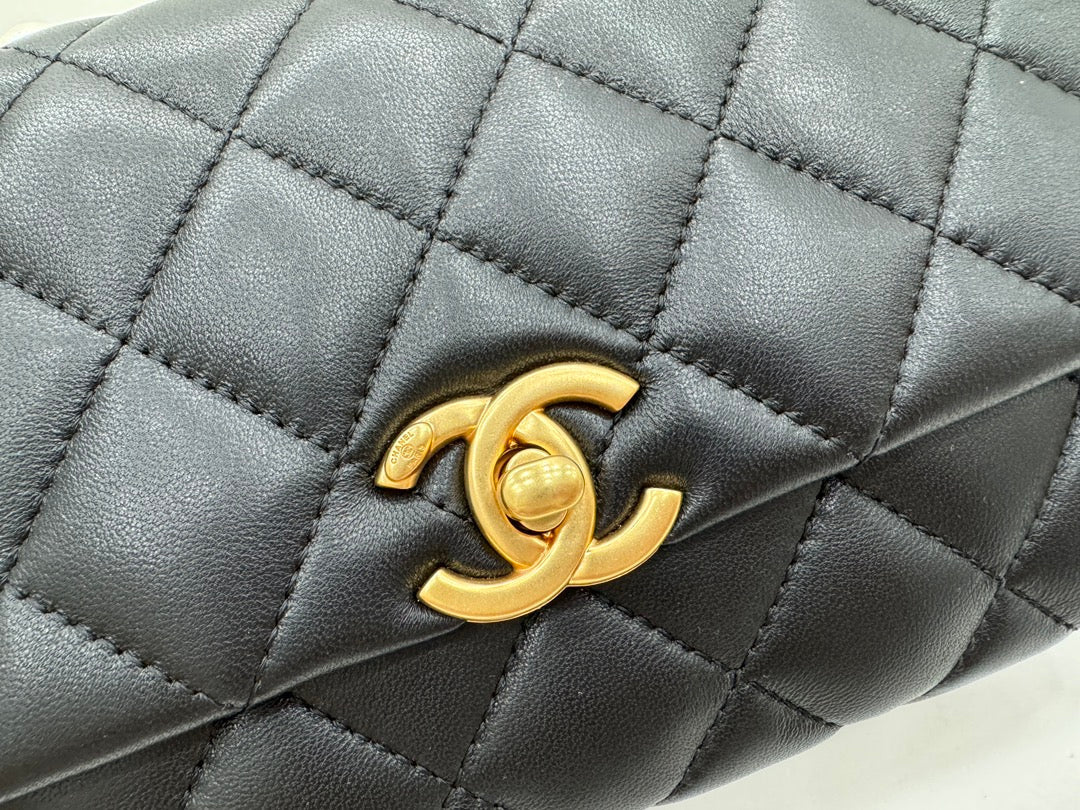 CHANEL 25S FLAP BAG 23 CM IN BLACK LAMBSKIN WITH PEARL TOP HANDLE